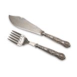 TWO PIECES OF SILVER FISH CUTLERY, PUNCH SHEFFIELD 1929 with silver-plated blades and handles