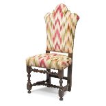TALL WALNUT CHAIR, ELEMENTS OF THE 18TH CENTURY high crenellated back, with spool legs and