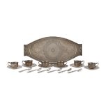 TEA SERVICE IN SILVER, MIDDLE EAST EARLY 20TH CENTURY elements chiseled to small Carthusian