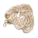 TORCHON NECKLACE seven threads of river pearls with silver-plated clasp. Length cm. 43,00. COLLANA