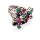 ATTRACTIVE RING in white gold 18 kts., with flowers decorated with sapphires, rubies and emeralds.