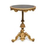 SMALL TABLE IN GILTWOOD, 19TH CENTURY carved to motifs of leaves, scrolls and pods. Crenellated