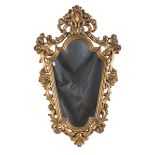 GILTWOOD MIRROR, VENETIAN LATE 19TH CENTURY carved to scrolls, leaves, roses and sunflowers.