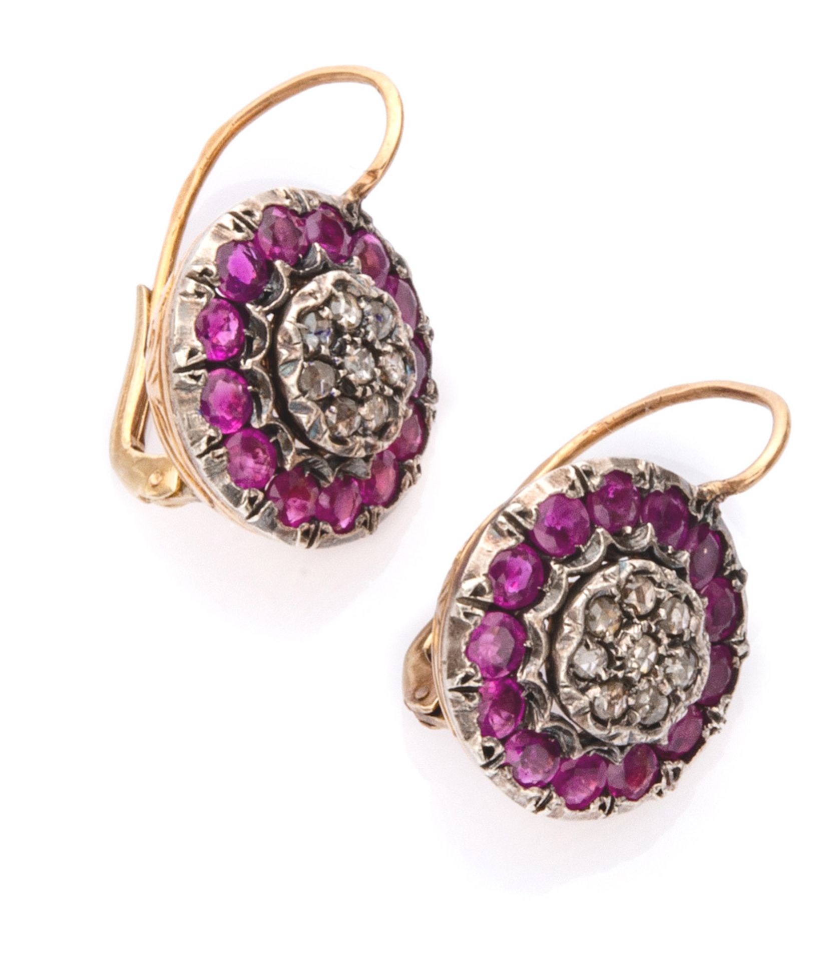 BEAUTIFUL EARRINGS in yellow gold 18 kts. and silver, decorated with pavé of rubies and rose cut