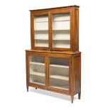 BOOKCASE CABINET IN WALNUT, CENTRAL ITALY EARLY 19TH CENTURY with two glass doors and square tapered