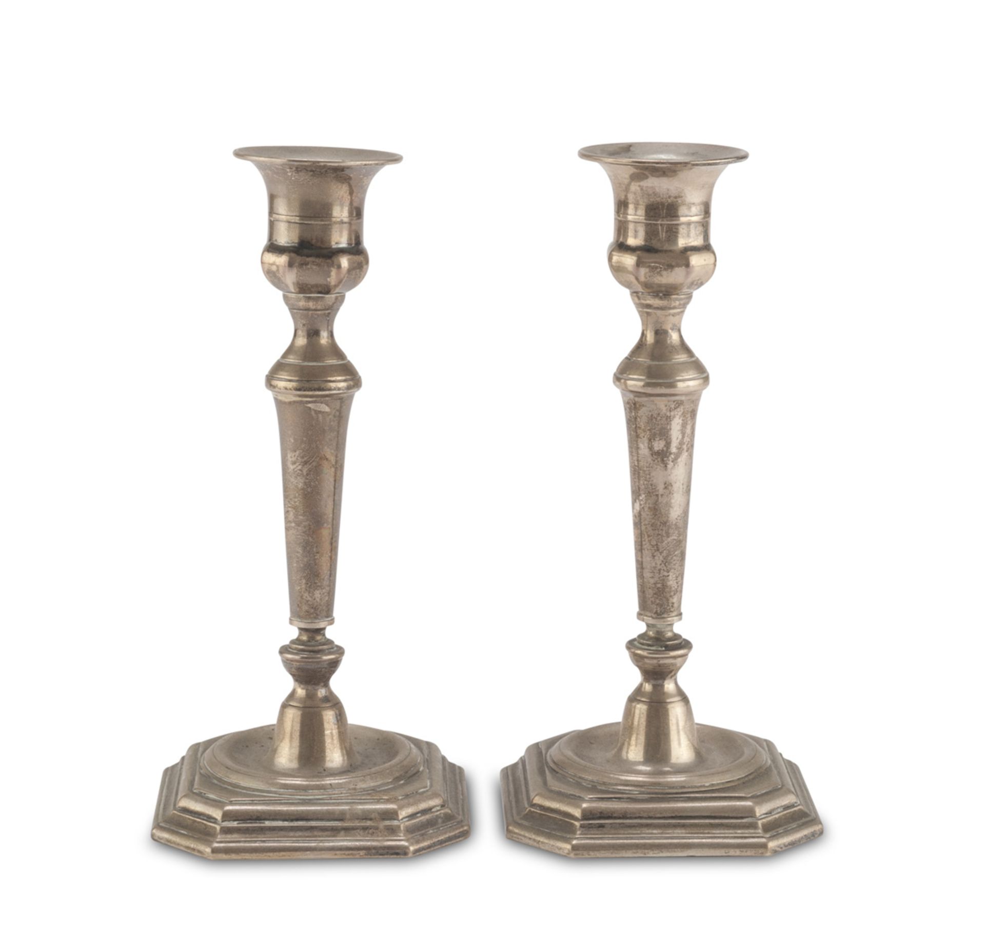 A PAIR OF CANDLESTICKS IN SILVER PUNCH PADUA POST 1968