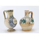 TWO PITCHERS IN MAIOLICA PROBABLY VITERBO 16TH CENTURY