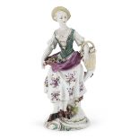 FIGURE OF EGG SELLER IN PORCELAIN PROBABLY GINORI EARLY 19TH CENTURY