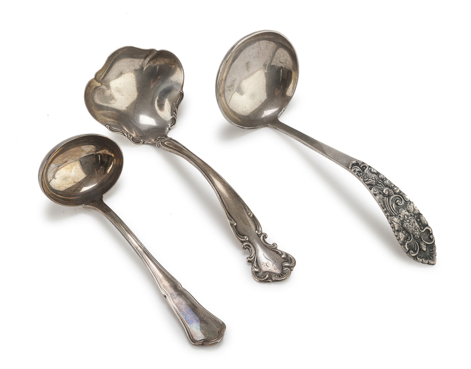 THREE SAUCE LADLES IN SILVER - EARLY 20TH CENTURY