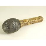 CARVED RATTLE.