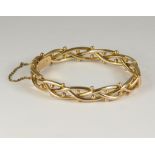 GOLD BANGLE.