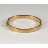 GOLD BANGLE.