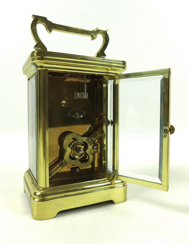 A 20th century carriage clock, of conventional form with glazed brass case, - Image 3 of 4