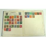 A mid 20th century stamp album, The Victory, containing a collection of British and World stamps,