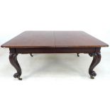 A Victorian dining table, labelled Thomas Mills, Bradford, moulded edge to the rectangular surface,
