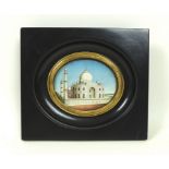 A fine Indian oval painting on ivory, 19th century, depicting the Taj Mahal at Agra,