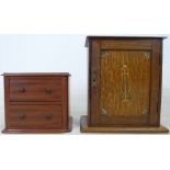 A mid 20th century oak smoker's cabinet,