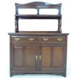 A late Victorian mahogany and rosewood sideboard,