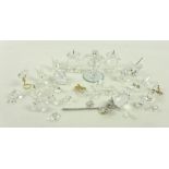 A group of twenty two Swarovski animals and items including a mouse, two pairs of candlesticks,