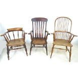 A group of three Victorian armchairs, comprising a Windsor with high spindle back,