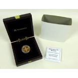 An Elizabeth II Jersey gold proof sovereign, 2010, in wooden presentation box with certificate.