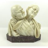 A Carrara marble portrait double bust, early 20th century, modelled as an elderly couple,