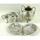 A collection of Victorian and later silver comprising a a twin handled pedestal vase with impressed