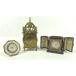 A collection of three early 20th century clocks comprising an Art Deco bedside clock,