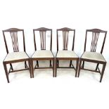 A set of six Edwardian mahogany dining chairs, with pierced backs,