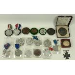 A group of commemorative medals and medallions, including coronation medals for Edward VII,