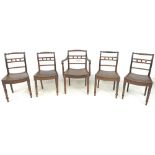 A set of five Regency mahogany dining chairs, including carver, with solid seats,
