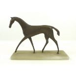 An Art Deco style sculpture, modelled as a stylised horse, metal painted to resemble bronze,