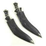 Two similar Kukri knives,
