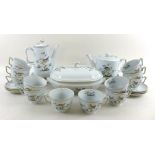 A Spode twelve person tea set, Queen's Bird pattern, comprising twelve cups, twelve saucers,