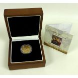 A George V gold sovereign, 1932, Pretoria, South Africa Mint, in wooden presentation box,