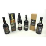 A group of four bottles of assorted ports, comprising Real Cca Velka 1984 Vintage Port,