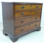 A George III mahogany chest of four graduating drawers with cock beading,