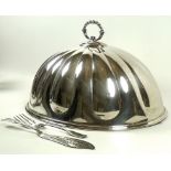 An early 19th century large silver plated on copper cloche, of fluted form with beaded handle,
