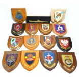 A group of military and associated squad wall plaques,