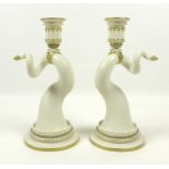 A pair of Royal Worcester porcelain candlesticks, circa 1890, shape 1056,