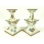 A pair of Royal Worcester porcelain candlesticks, circa 1874, in the Japanese taste,