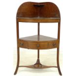 A Regency mahogany wash stand with cutouts for jug and bowl set, single drawer,