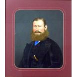 A portrait of an Edwardian gentleman, with bushy beard, wearing a navy overcoat,