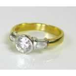 A modernist style diamond dress ring, the single brilliant cut diamond of approximately 1ct,