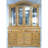 A modern American oak dresser bookcase, with glazed upper section, glass shelves,
