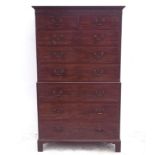 A late George III figured mahogany chest on chest,