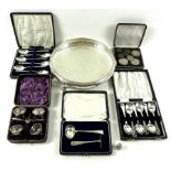 A collection of silver comprising two sets of six silver teaspoons,
