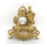 A French late 19th century gilt metal figural mantel clock,