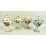 A set of four modern Royal Worcester pedestal vases and covers, with twin moulded handles