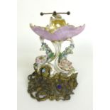 A porcelain and gilt metal mounted salt cellar, probably French early 19th century, decorated with